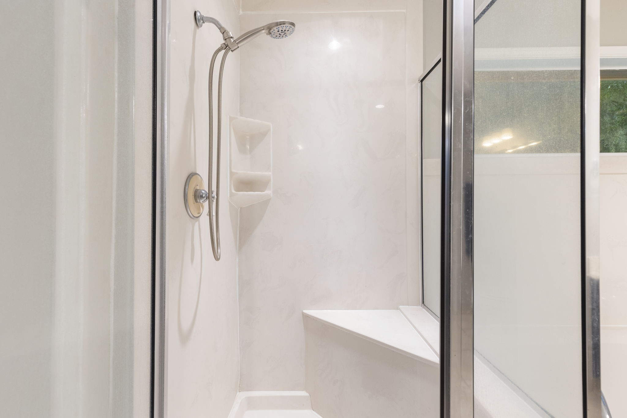 245 Lakeland Road Huntsville, TX 77320 - Photo 25 of 49 The primary shower features a convenient built-in bench