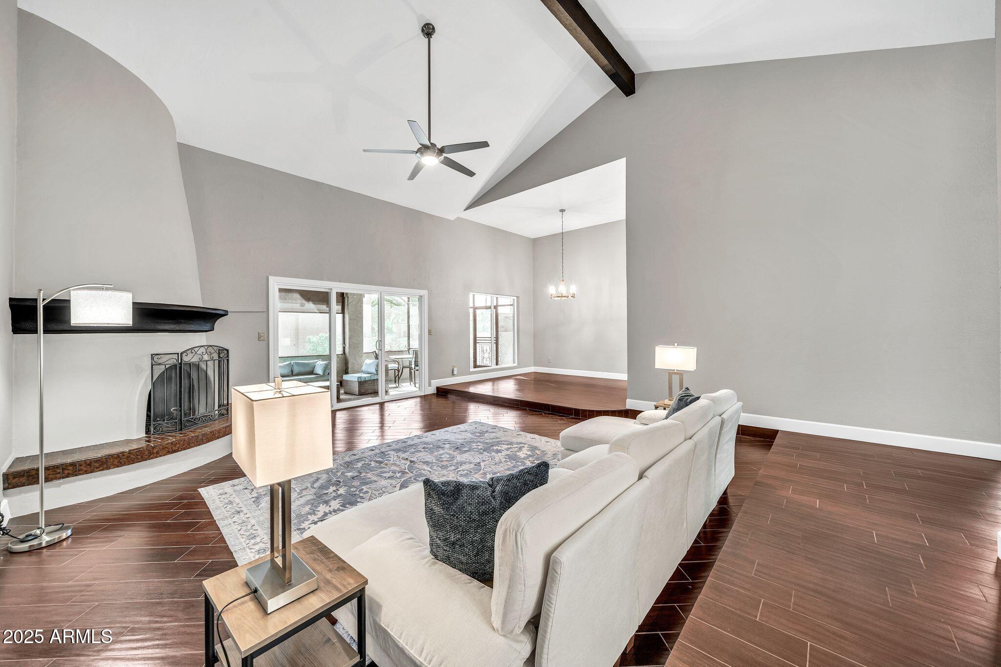 18548 East Parada Circle Rio Verde, AZ 85263 - Photo 10 of 35 a living room with furniture and a large window