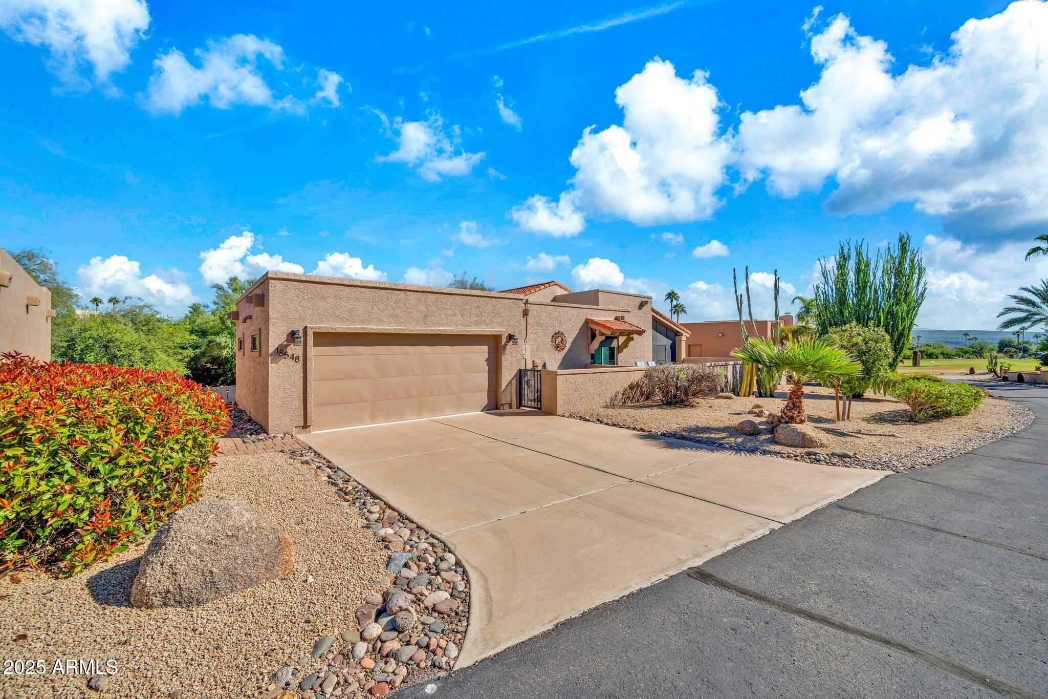 18548 East Parada Circle Rio Verde, AZ 85263 - Photo 20 of 35 a view of a backyard of the house