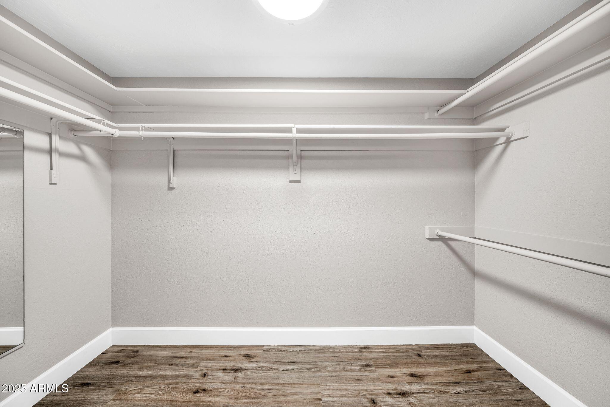 18548 East Parada Circle Rio Verde, AZ 85263 - Photo 26 of 35 a view of an empty walk in closet