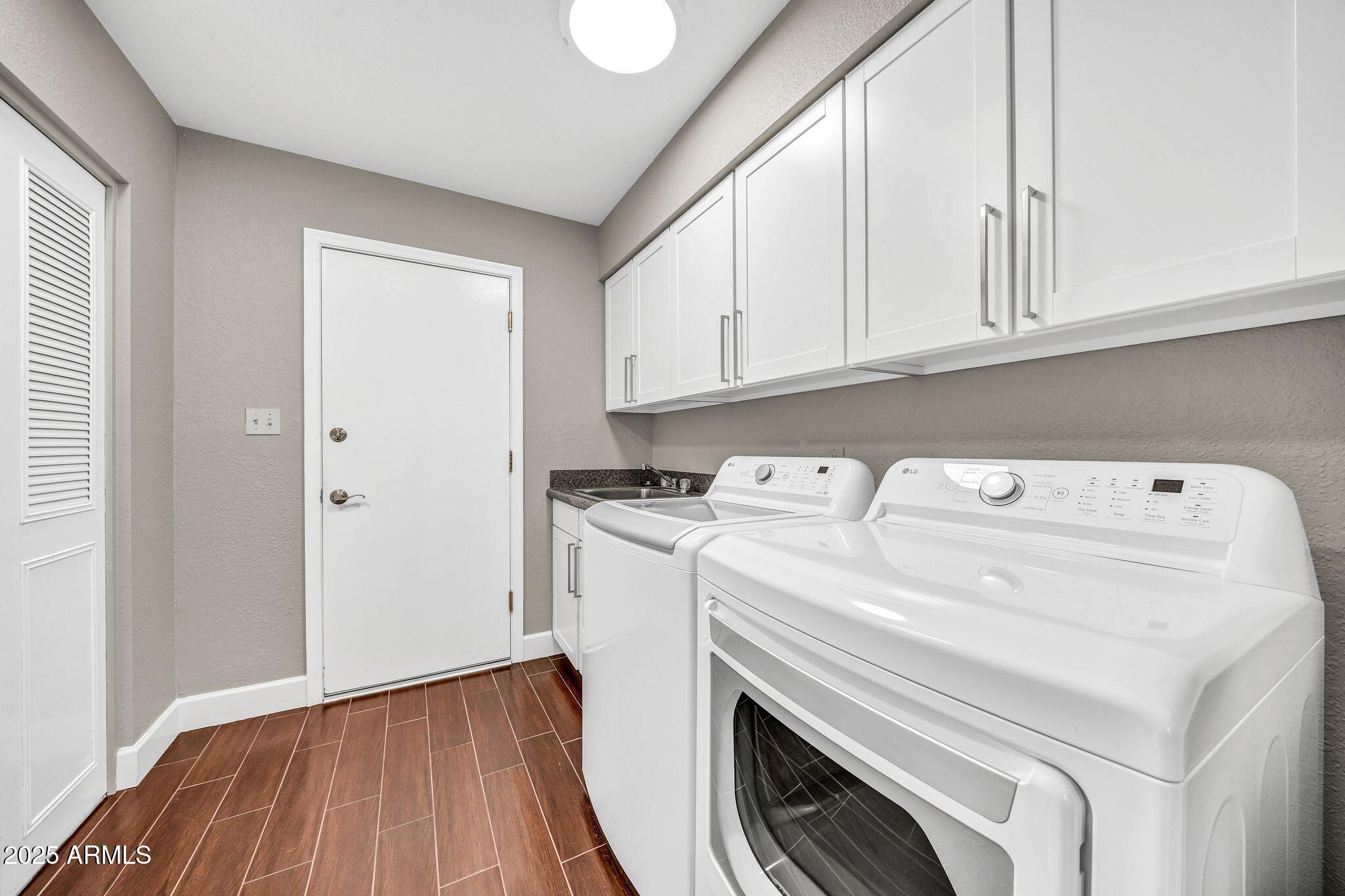 18548 East Parada Circle Rio Verde, AZ 85263 - Photo 31 of 35 a utility room with dryer and washer