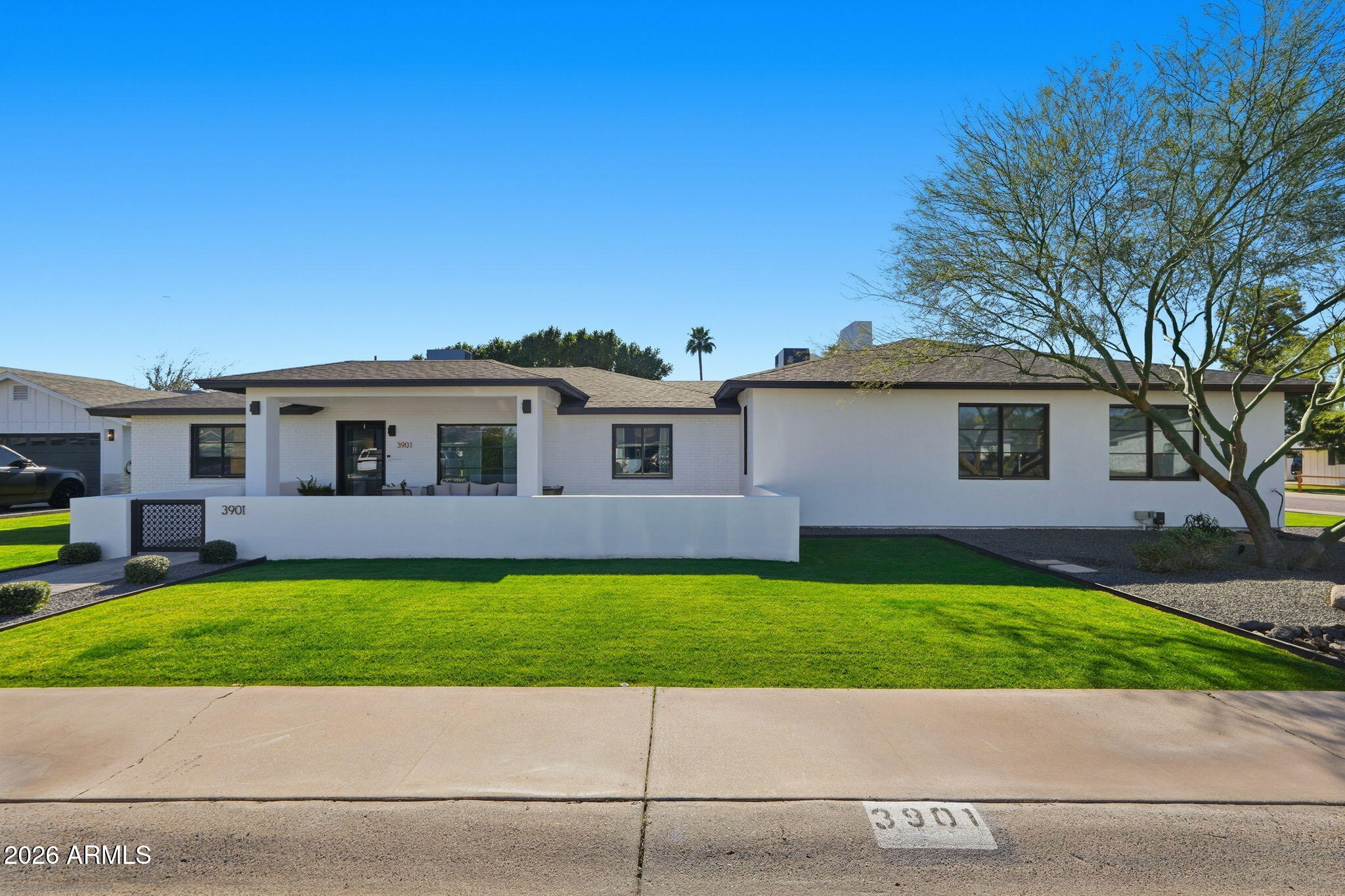 a view of a yard in front of a house