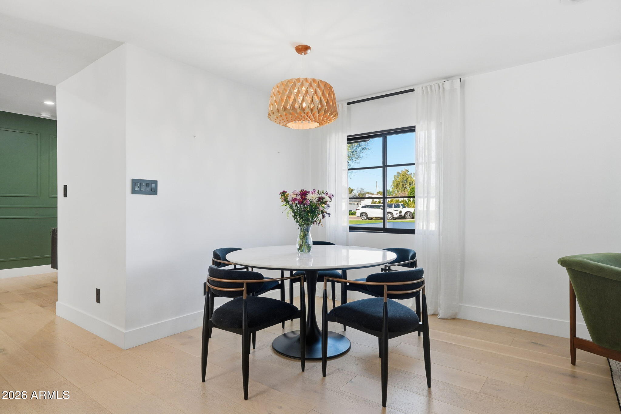 3901 East Weldon Avenue Phoenix, AZ 85018 - Photo 11 of 43 a view of a room with table and chair