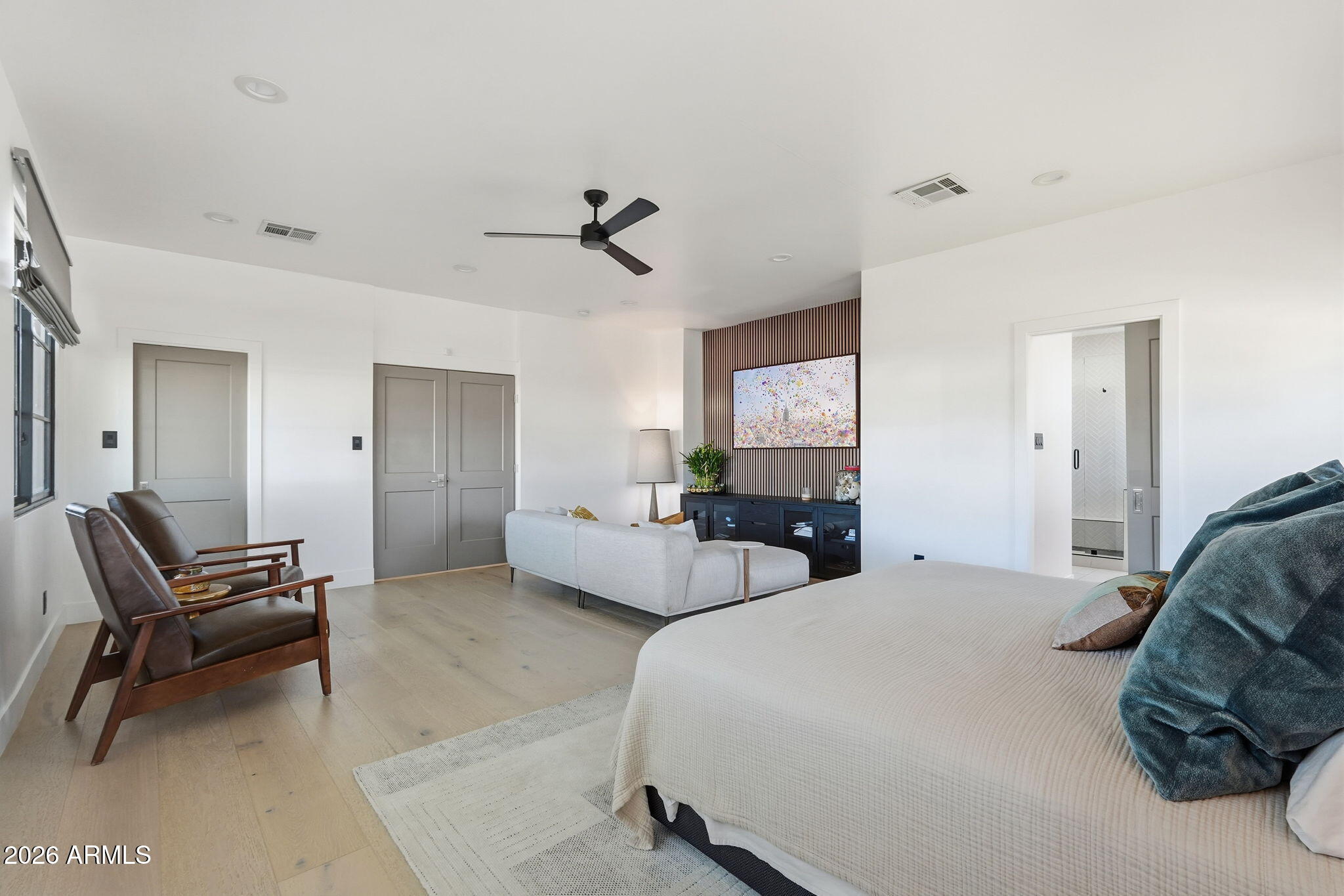3901 East Weldon Avenue Phoenix, AZ 85018 - Photo 12 of 27 a bedroom with a bed and furniture