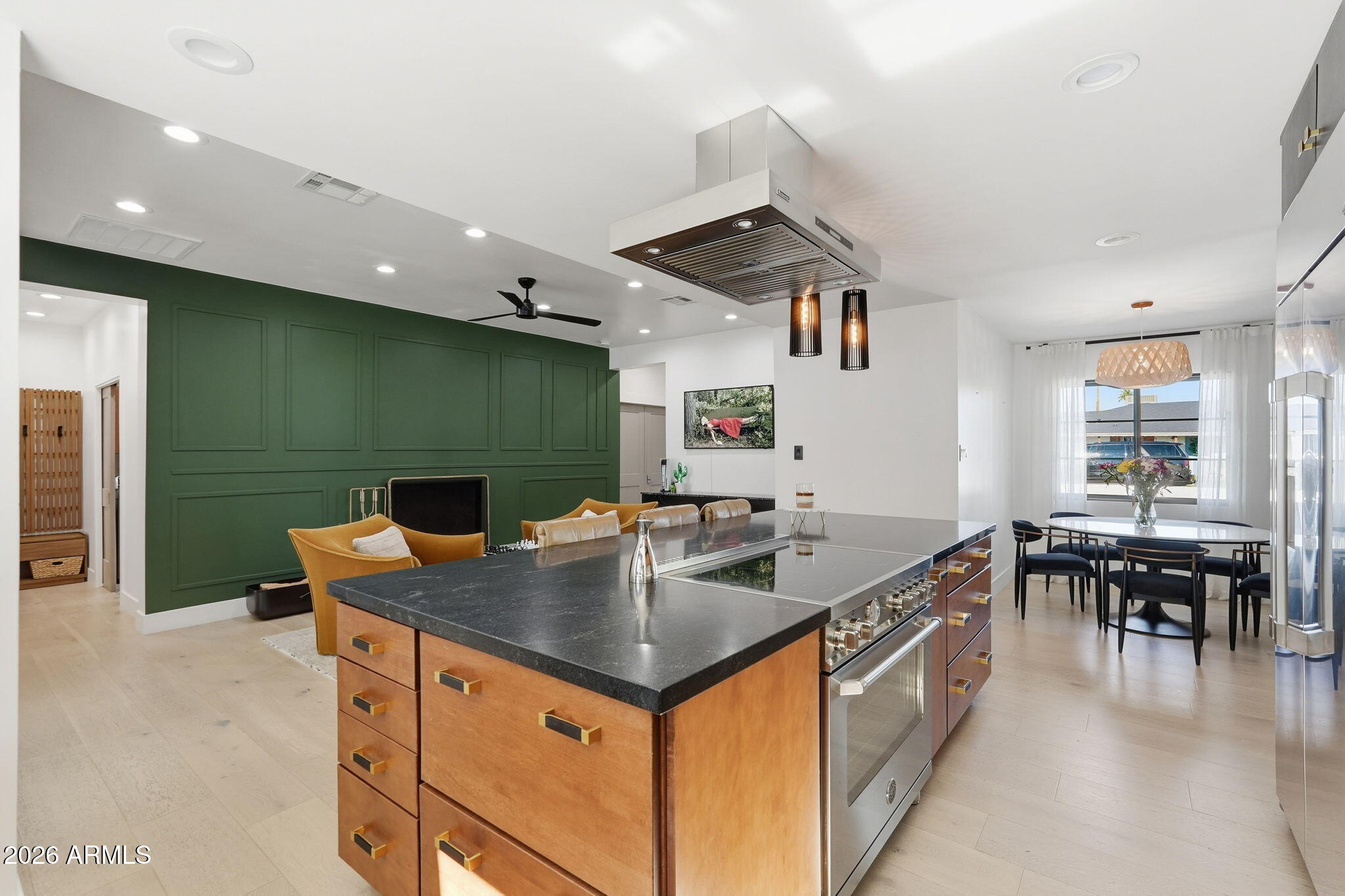 3901 East Weldon Avenue Phoenix, AZ 85018 - Photo 13 of 43 a kitchen with a stove and a table