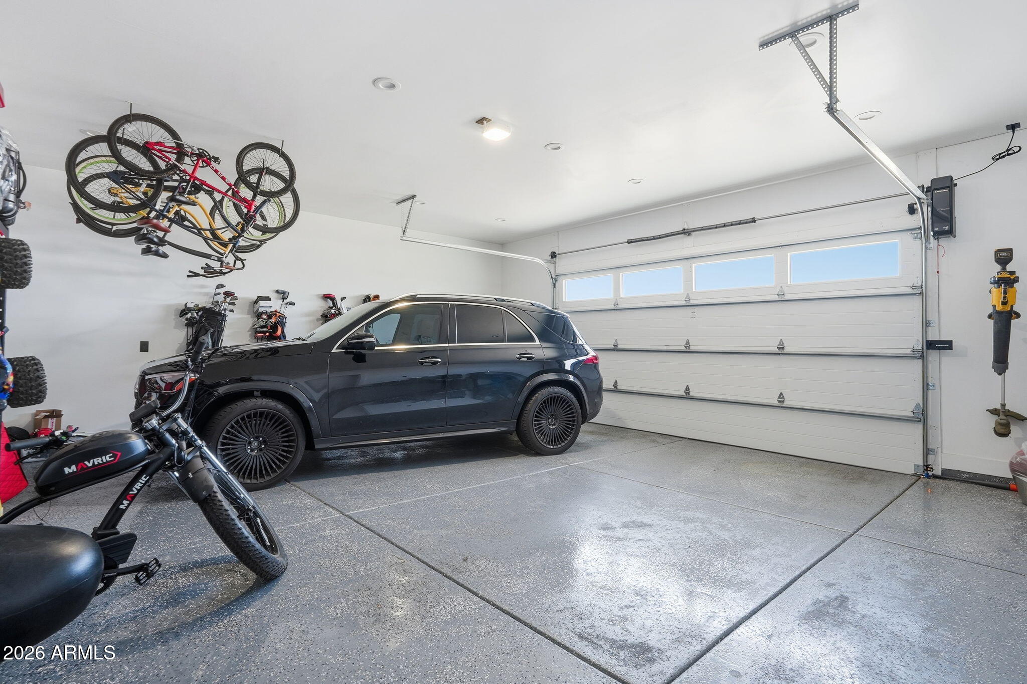 3901 East Weldon Avenue Phoenix, AZ 85018 - Photo 20 of 27 a view of a garage and car parked