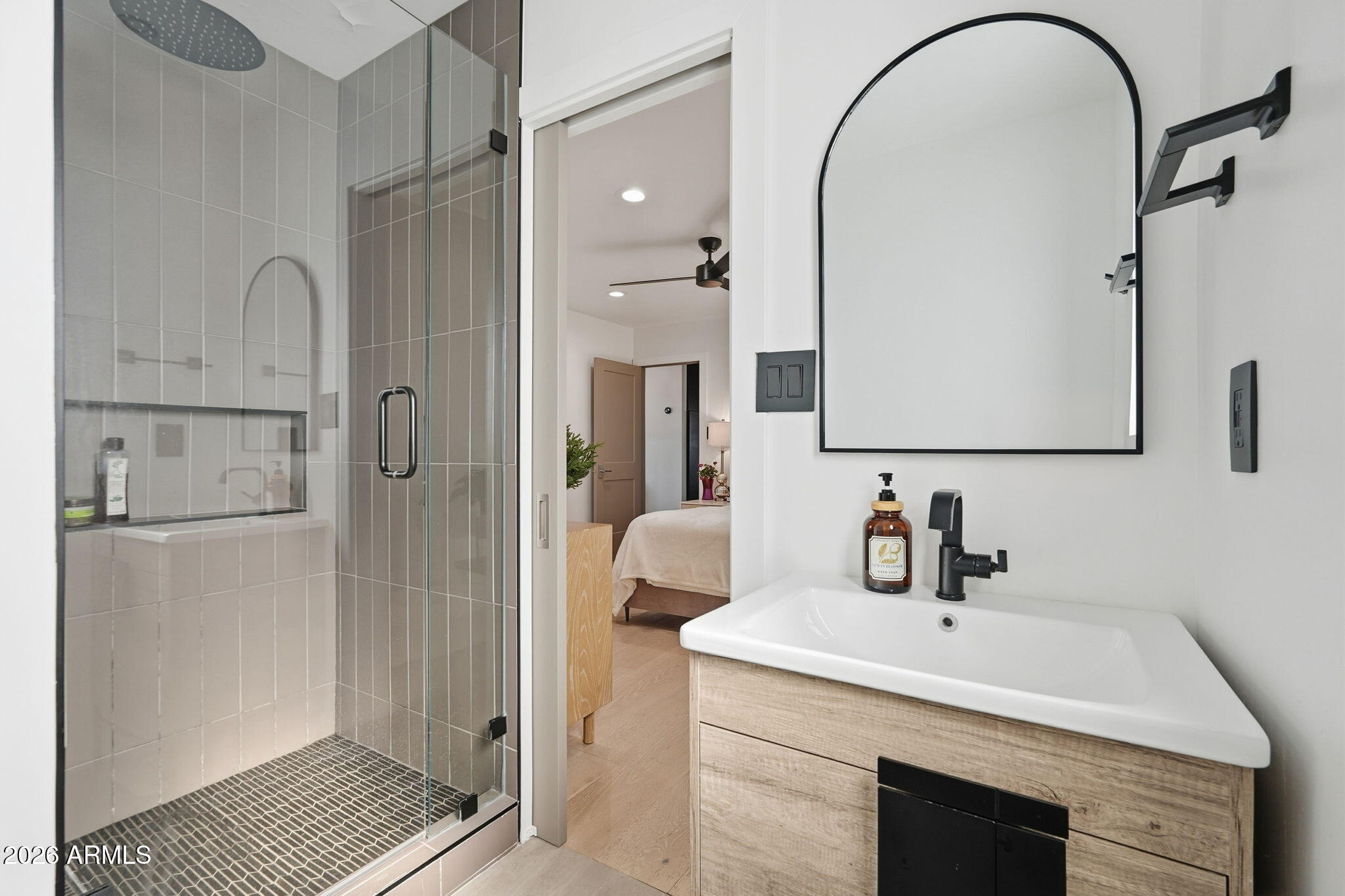 3901 East Weldon Avenue Phoenix, AZ 85018 - Photo 28 of 43 a bathroom with a sink and a mirror