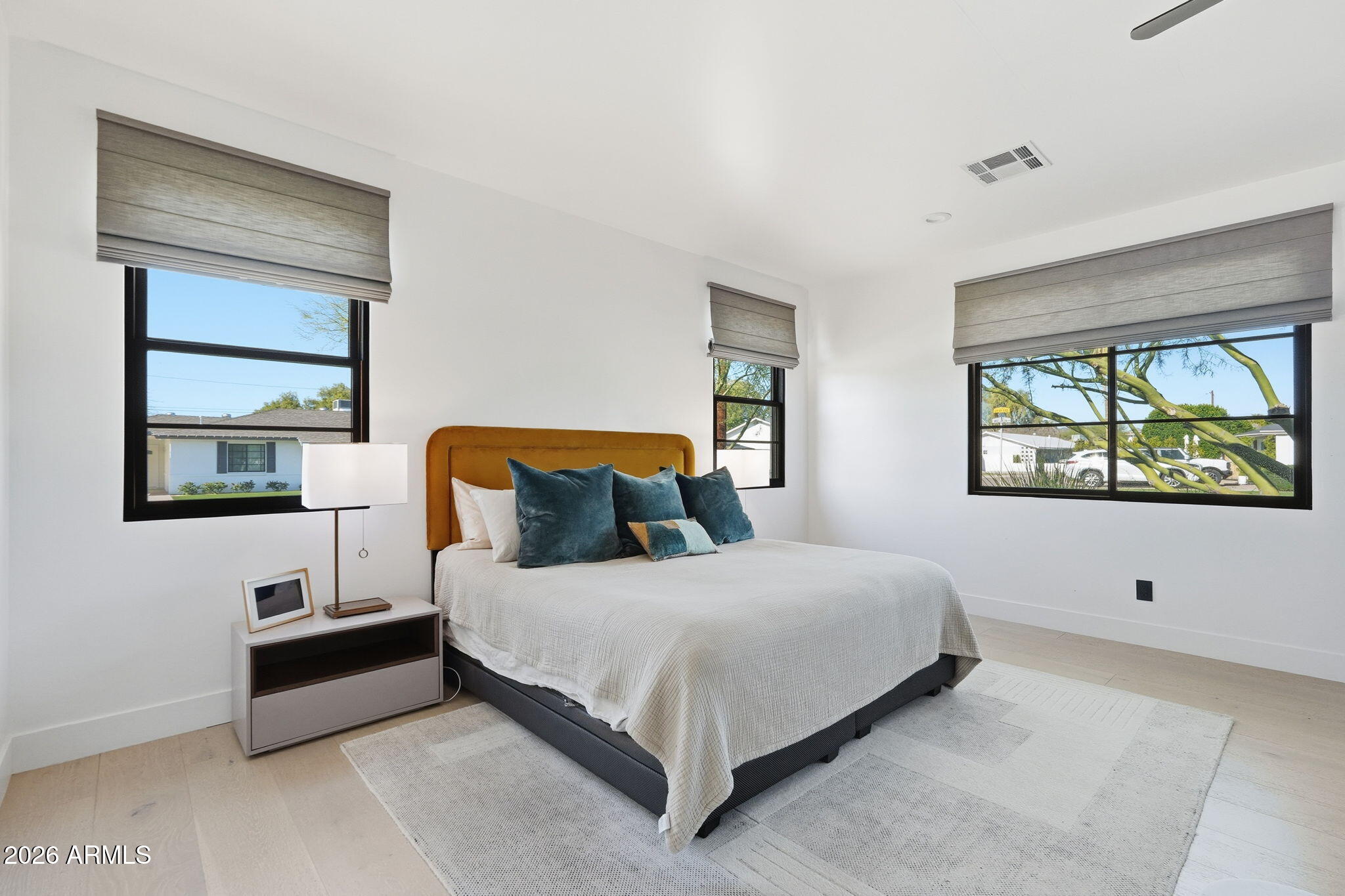 3901 East Weldon Avenue Phoenix, AZ 85018 - Photo 30 of 43 a bedroom with a bed and window