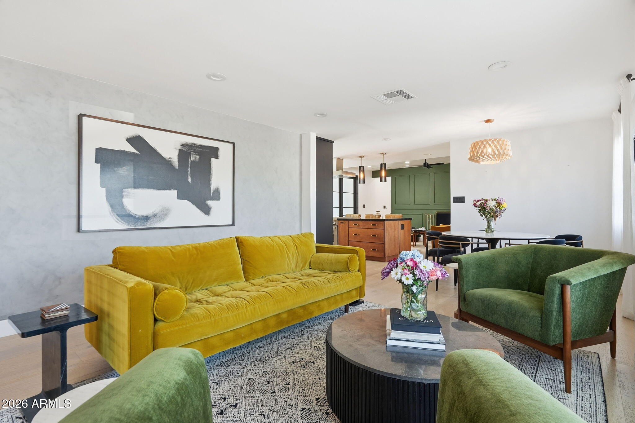 3901 East Weldon Avenue Phoenix, AZ 85018 - Photo 5 of 43 a living room with furniture and a couch