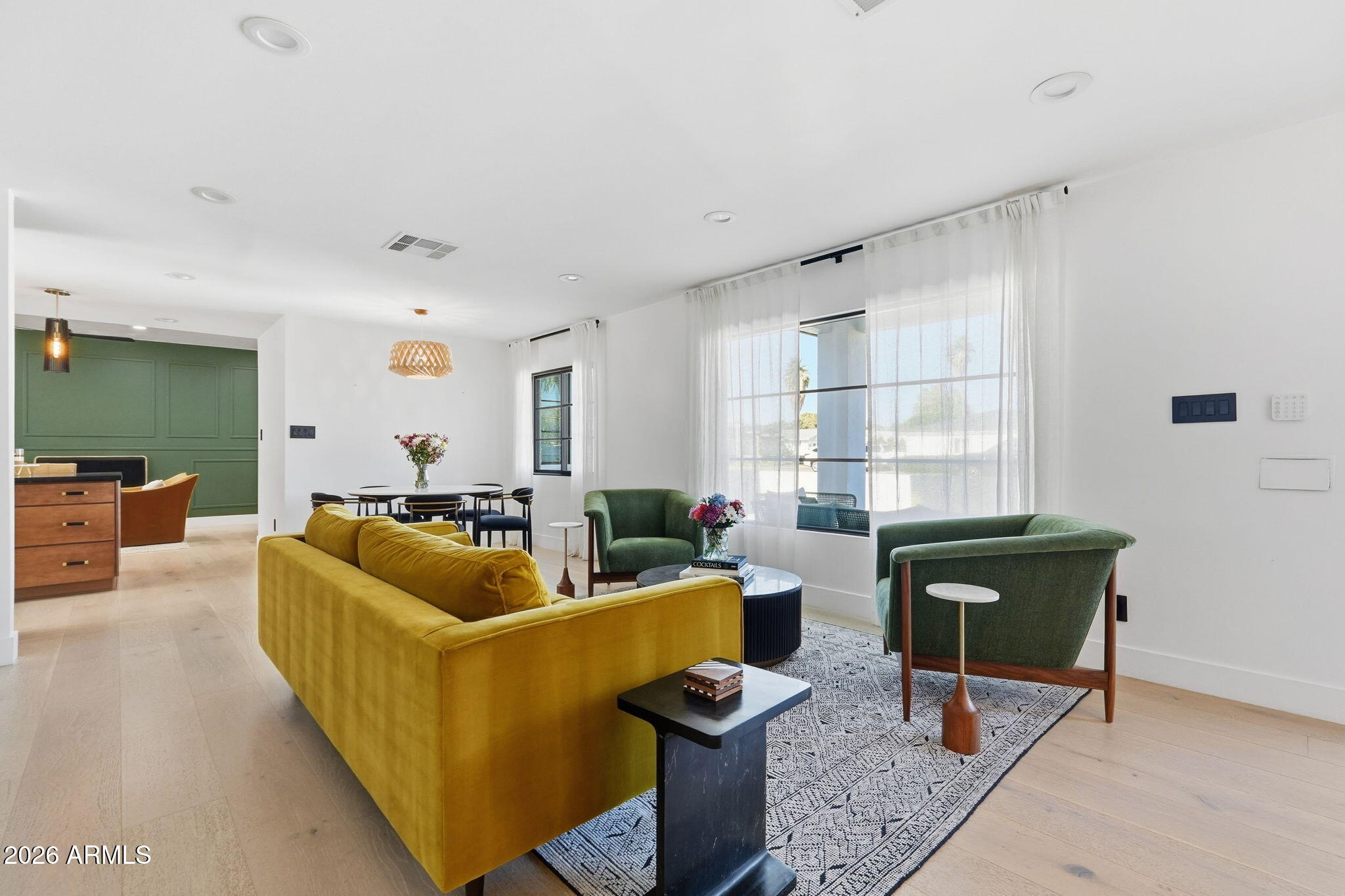 3901 East Weldon Avenue Phoenix, AZ 85018 - Photo 6 of 43 a living room with furniture and a window