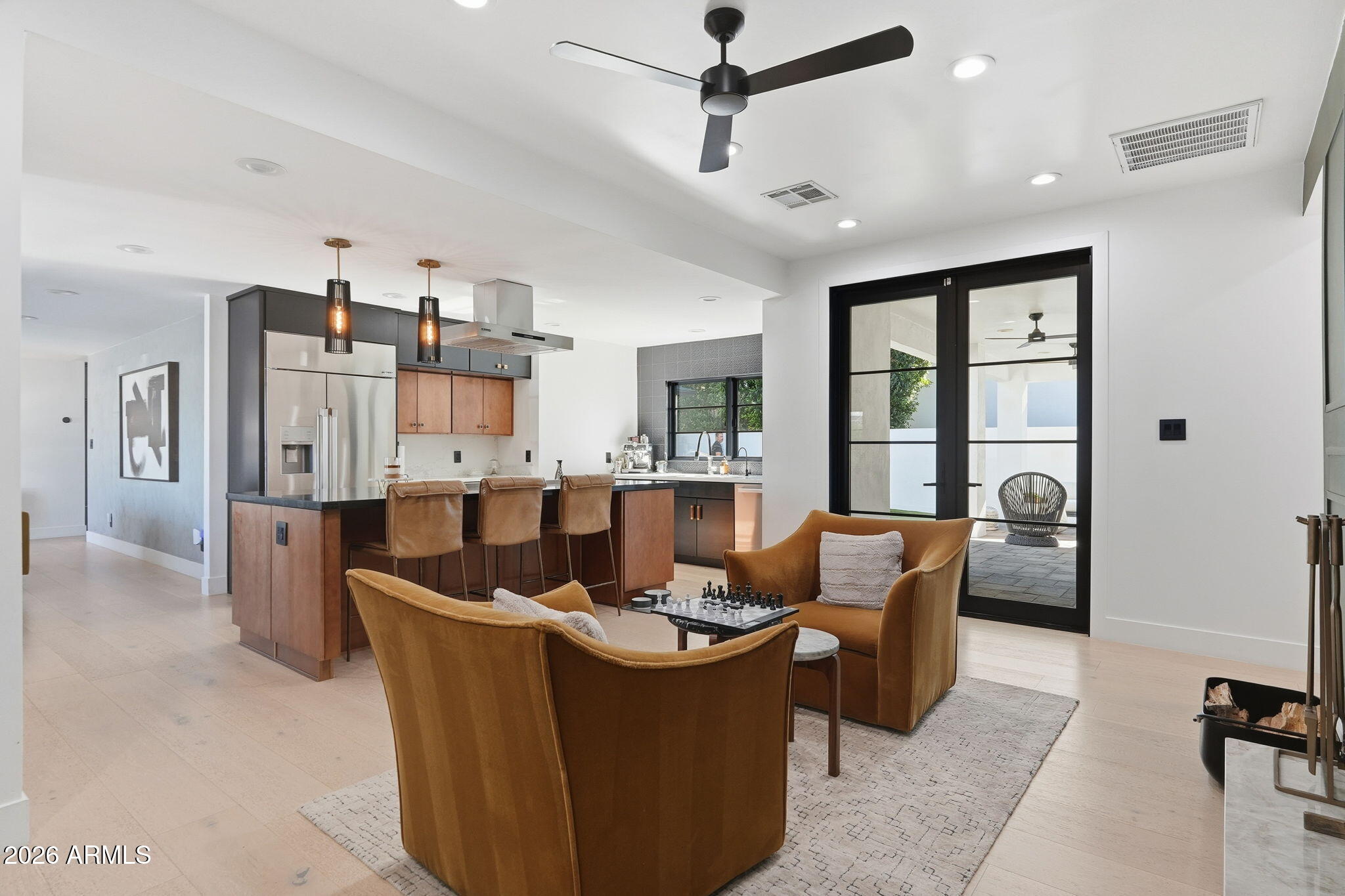 3901 East Weldon Avenue Phoenix, AZ 85018 - Photo 8 of 43 a view of a dining room with furniture window and wooden floor