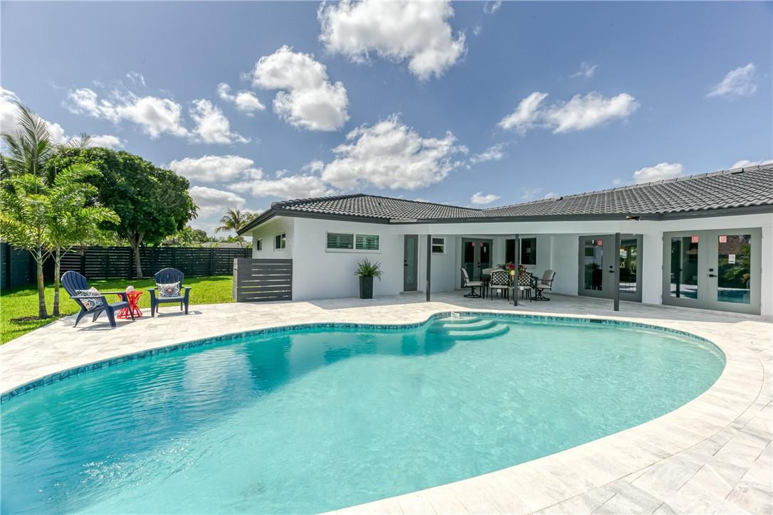 1382 Southwest 13th Drive Boca Raton, FL 33486 - Photo 40 of 65 New tile and redone pool