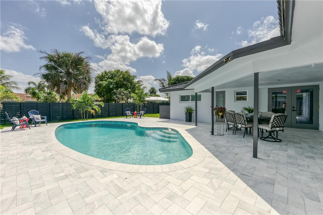 1382 Southwest 13th Drive Boca Raton, FL 33486 - Photo 42 of 65 Pool with covered area