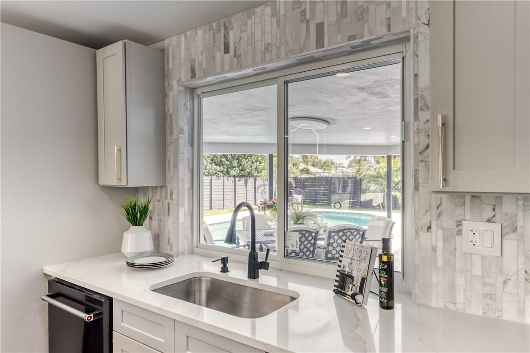 1382 Southwest 13th Drive Boca Raton, FL 33486 - Photo 9 of 65 Pool view from the kitchen
