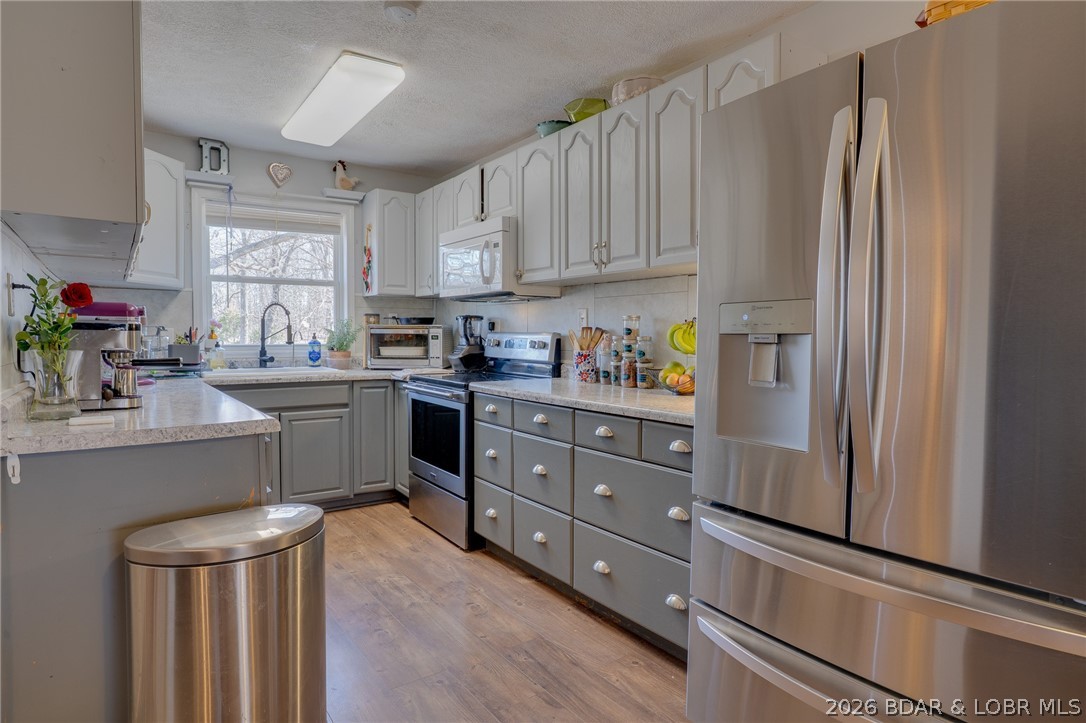 219 Indian Park Road Sunrise Beach, MO 65079 - Photo 6 of 38 Kitchen