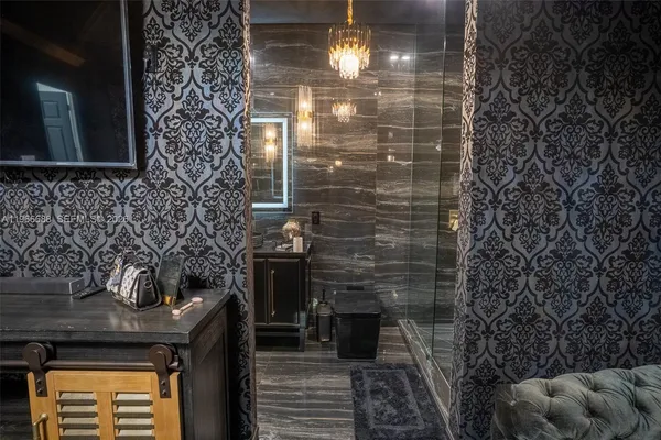 a bathroom with a sink and a shower