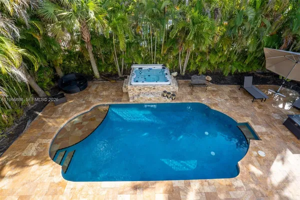 a table and chairs in a balcony
