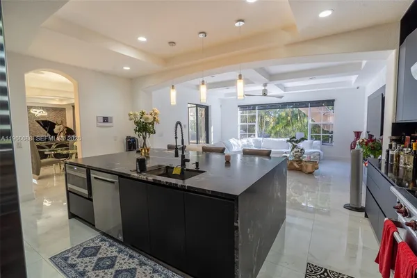 a kitchen with lots of counter space and a sink