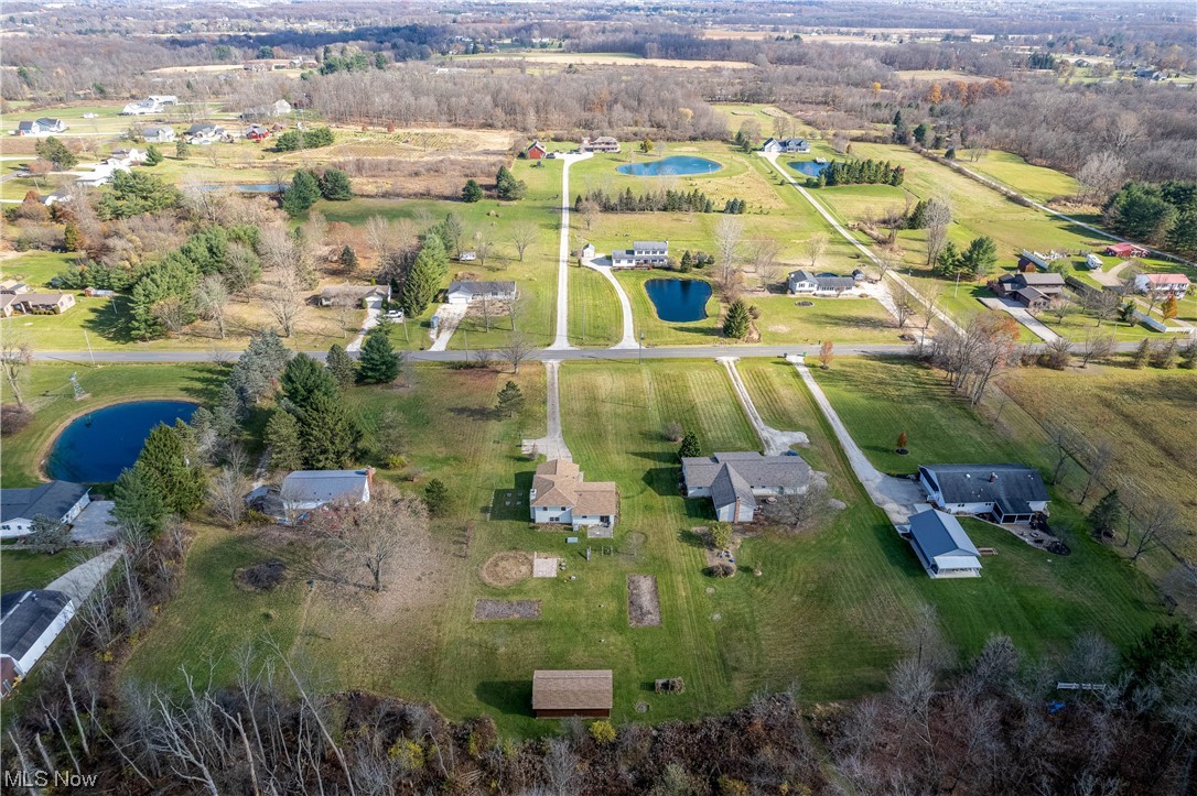 5680 Lance Road Medina, OH 44256 - Photo 9 of 32 Drone / aerial view featuring a water view