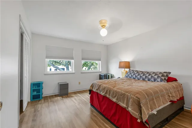 a bedroom with a bed and a table