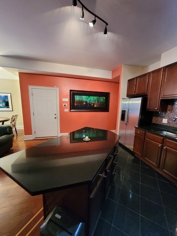 4546 South Indiana Avenue, Unit 2N Chicago, IL 60653 - Photo 5 of 16 a room with furniture and a potted plant