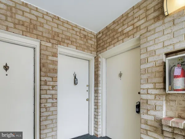 a bathroom with a shower and a sink