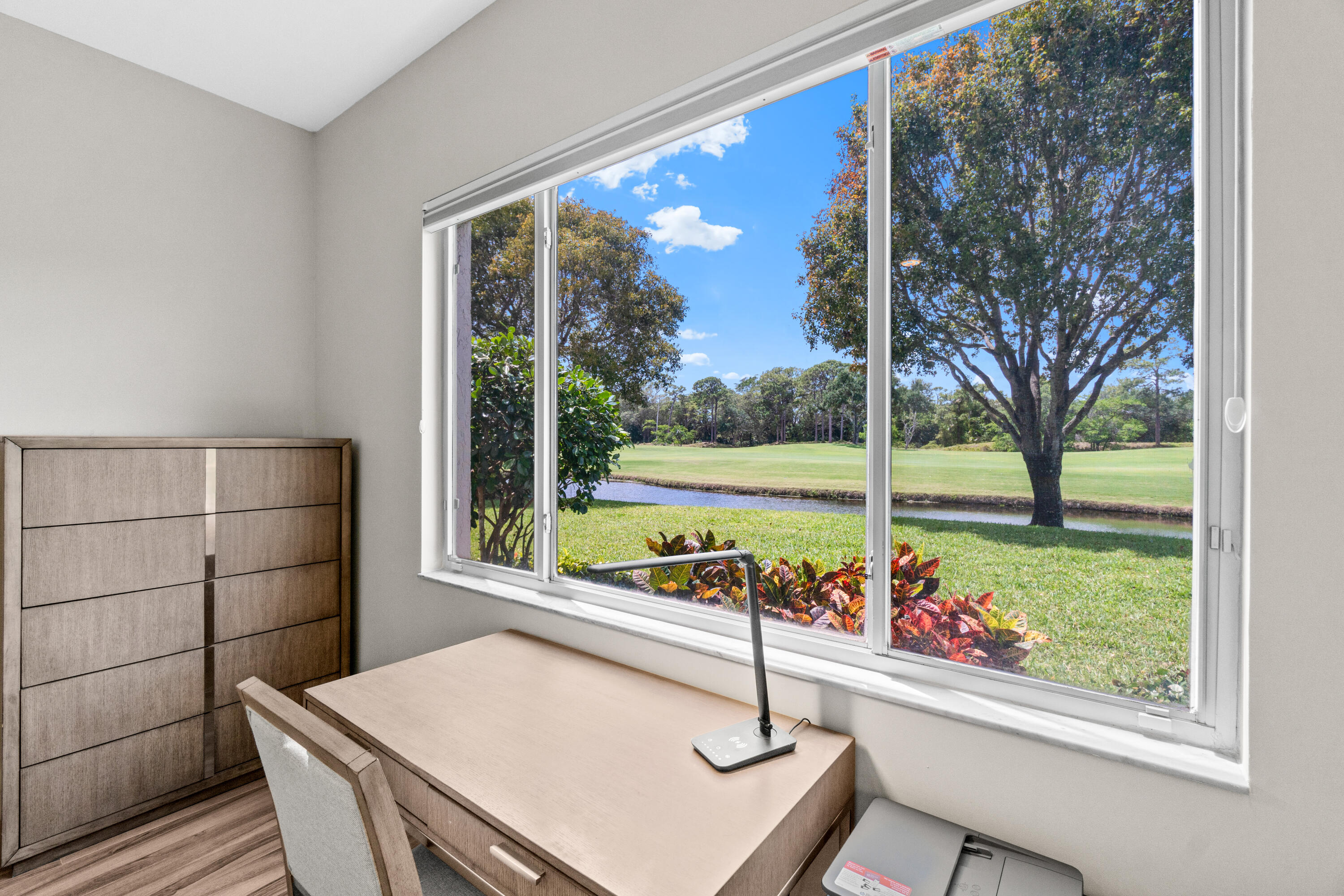 17629 Ashbourne Lane, Unit A Boca Raton, FL 33496 - Photo 17 of 35 Primary Bedroom Desk with View