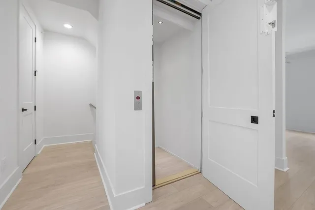 a view of hallway with shower