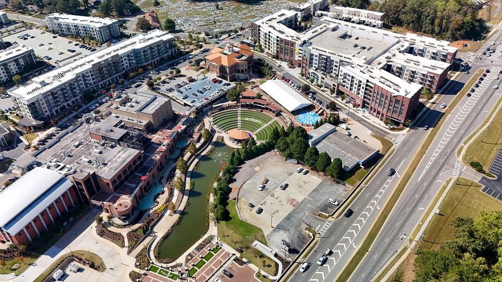 332 Sugarview Road, Unit 16 Sugar Hill, GA 30518 - Photo 27 of 31 an aerial view of a city with lots of residential buildings