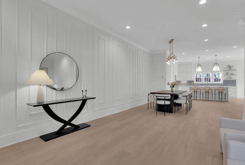 332 Sugarview Road, Unit 16 Sugar Hill, GA 30518 - Photo 10 of 31 a view of a room with gym equipment and a wooden floor