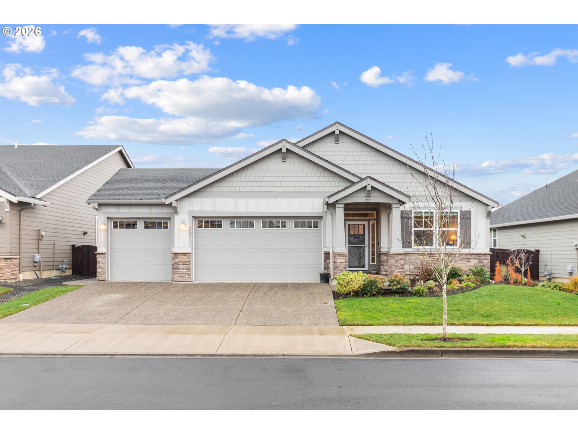 4935 South 16th Drive Ridgefield, WA 98642 - Photo 1 of 47 a view of a house with a big yard and large trees