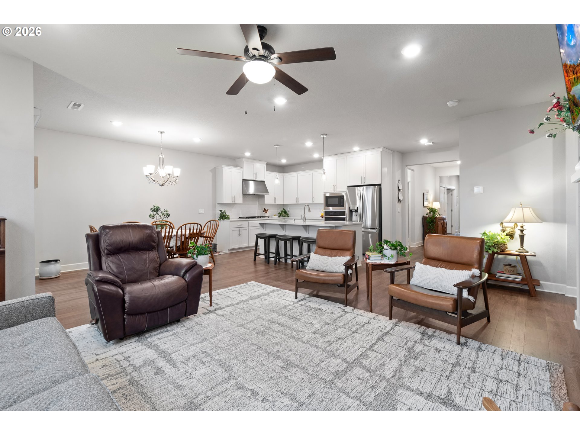 4935 South 16th Drive Ridgefield, WA 98642 - Photo 12 of 47 a living room with furniture and kitchen view