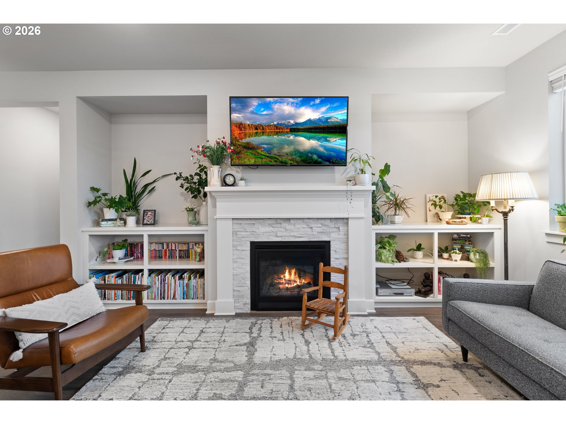 4935 South 16th Drive Ridgefield, WA 98642 - Photo 14 of 47 a living room with furniture and a fireplace