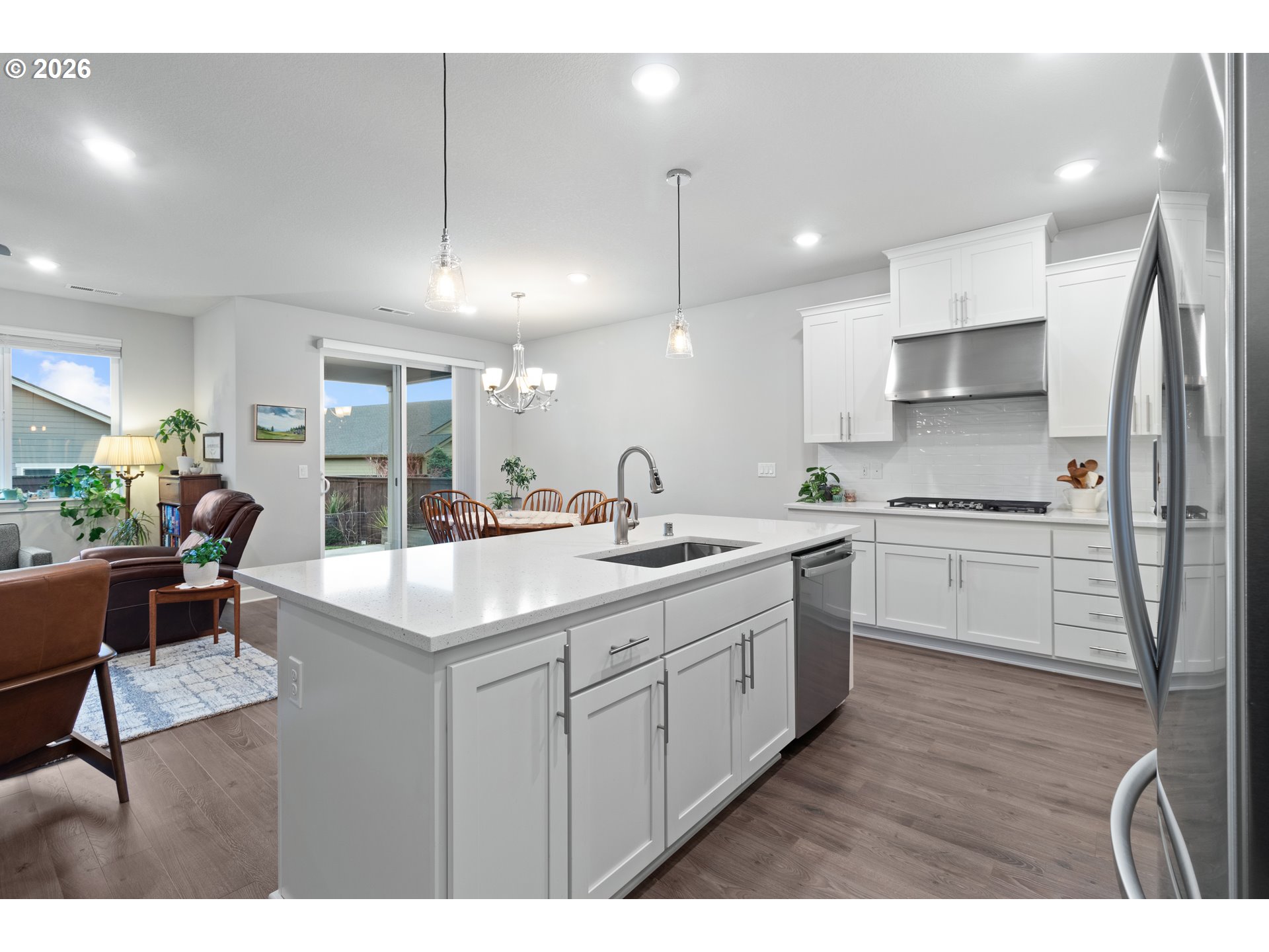 4935 South 16th Drive Ridgefield, WA 98642 - Photo 20 of 47 a kitchen with counter top space sink stove and refrigerator