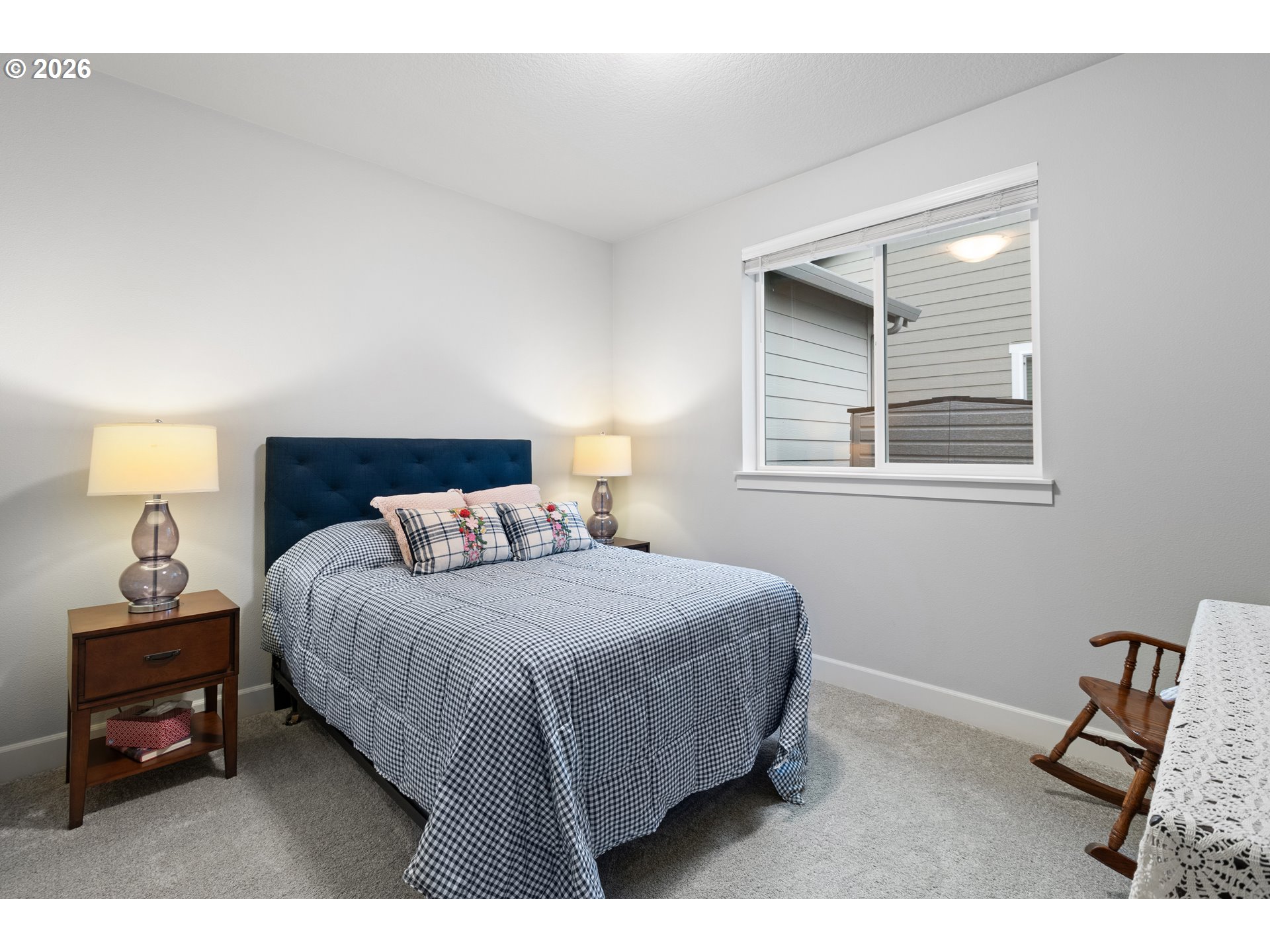 4935 South 16th Drive Ridgefield, WA 98642 - Photo 29 of 47 a bedroom with a bed window and a night stand