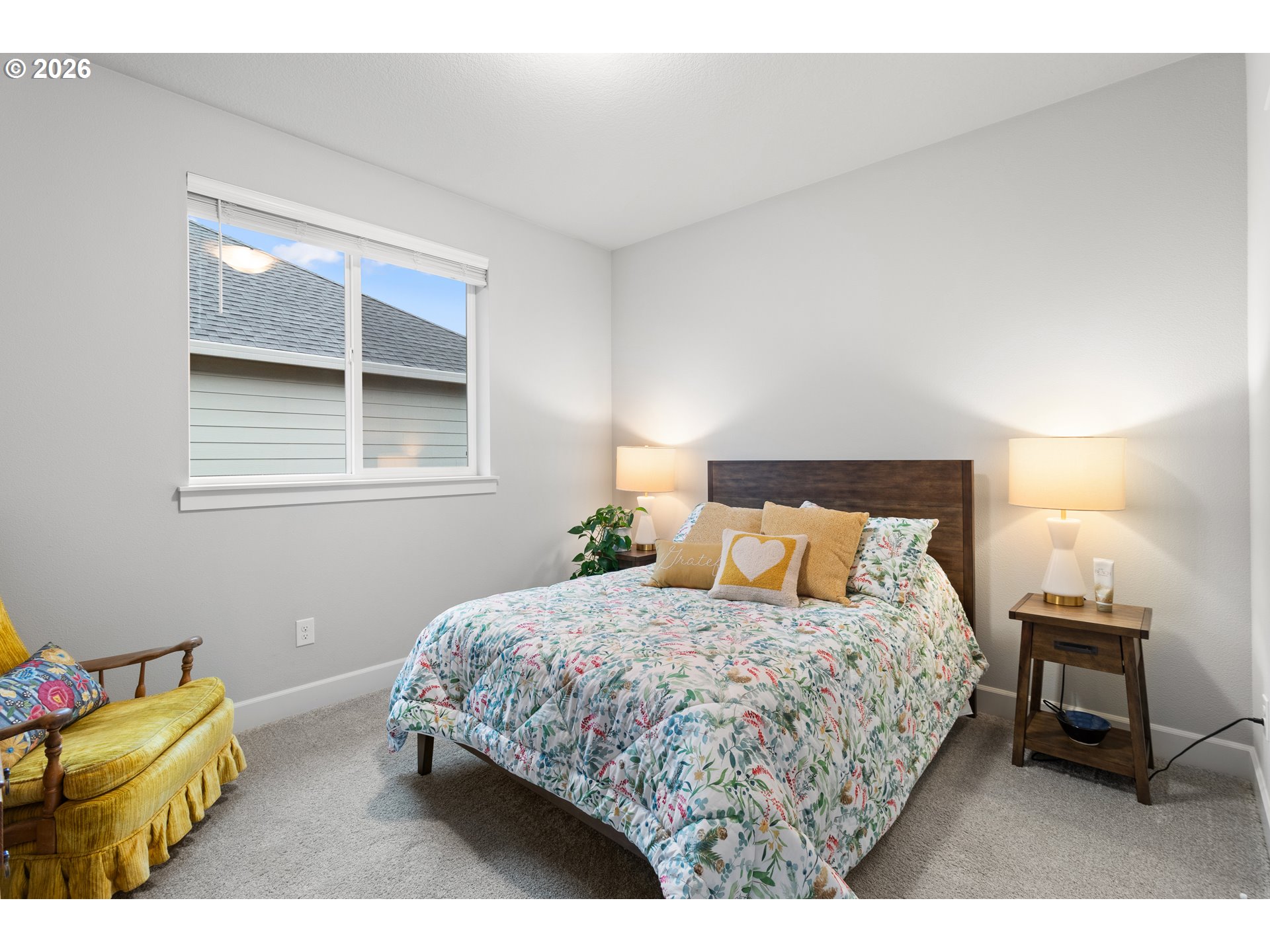 4935 South 16th Drive Ridgefield, WA 98642 - Photo 31 of 47 a bedroom with a bed and wooden floor