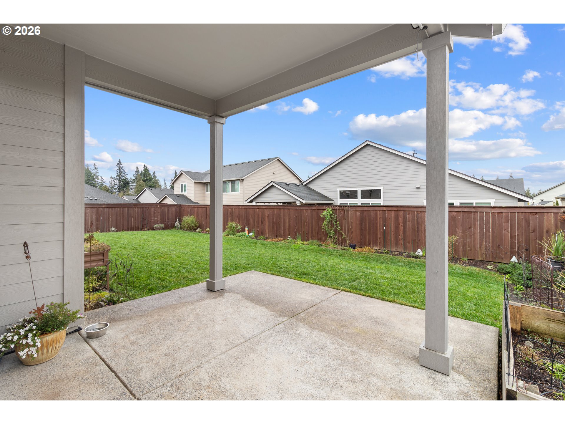 4935 South 16th Drive Ridgefield, WA 98642 - Photo 37 of 47 a view of a house with a big yard and garden