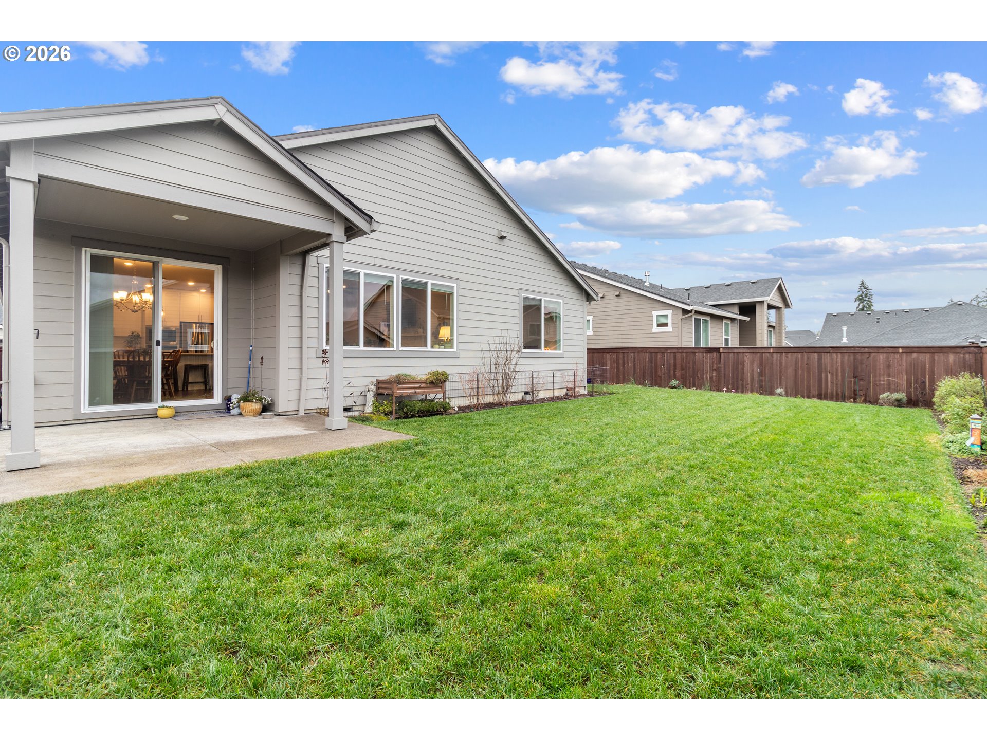 4935 South 16th Drive Ridgefield, WA 98642 - Photo 44 of 47 a front view of a house with a yard and porch