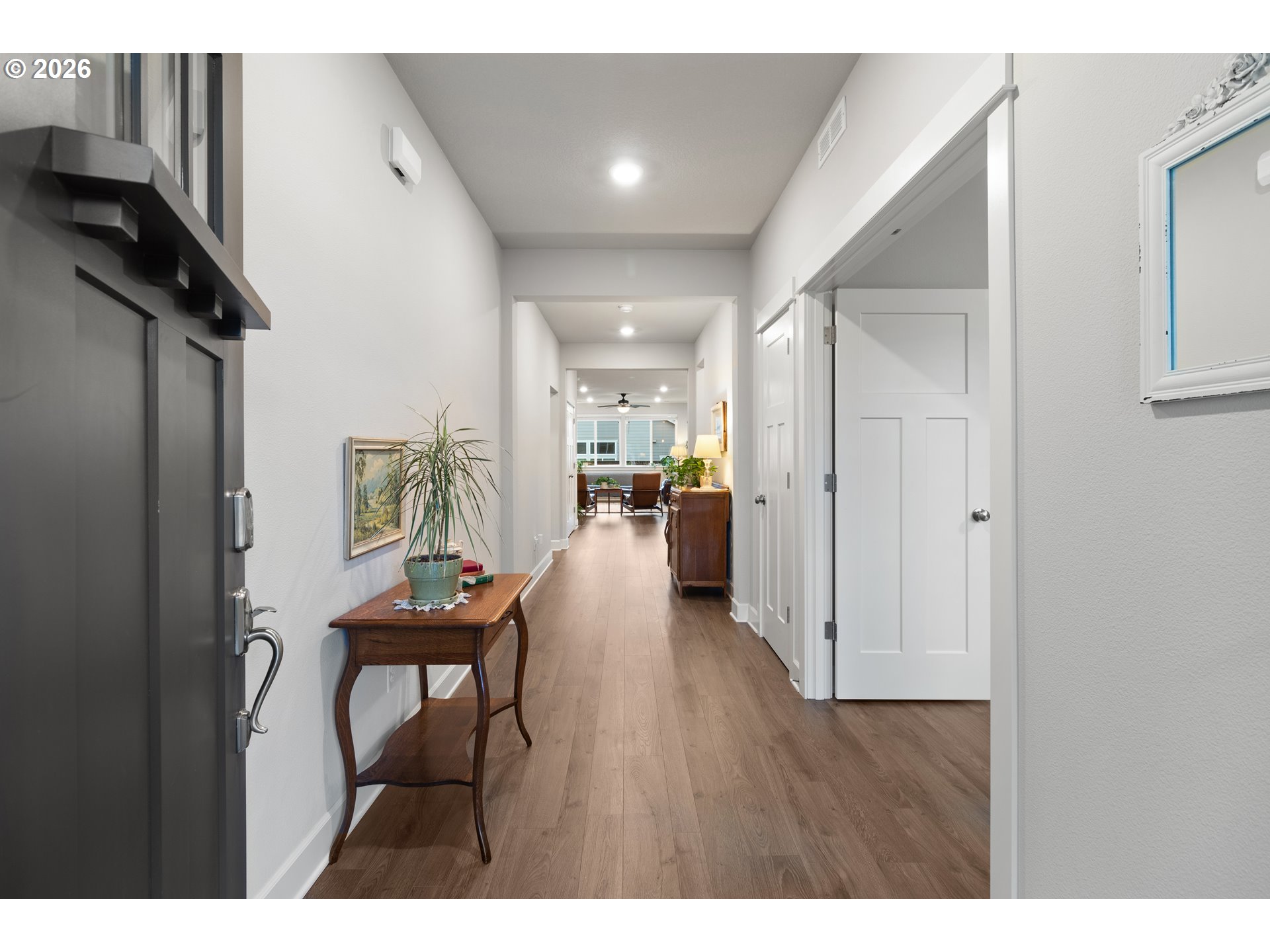 4935 South 16th Drive Ridgefield, WA 98642 - Photo 5 of 47 a open kitchen with furniture and a refrigerator