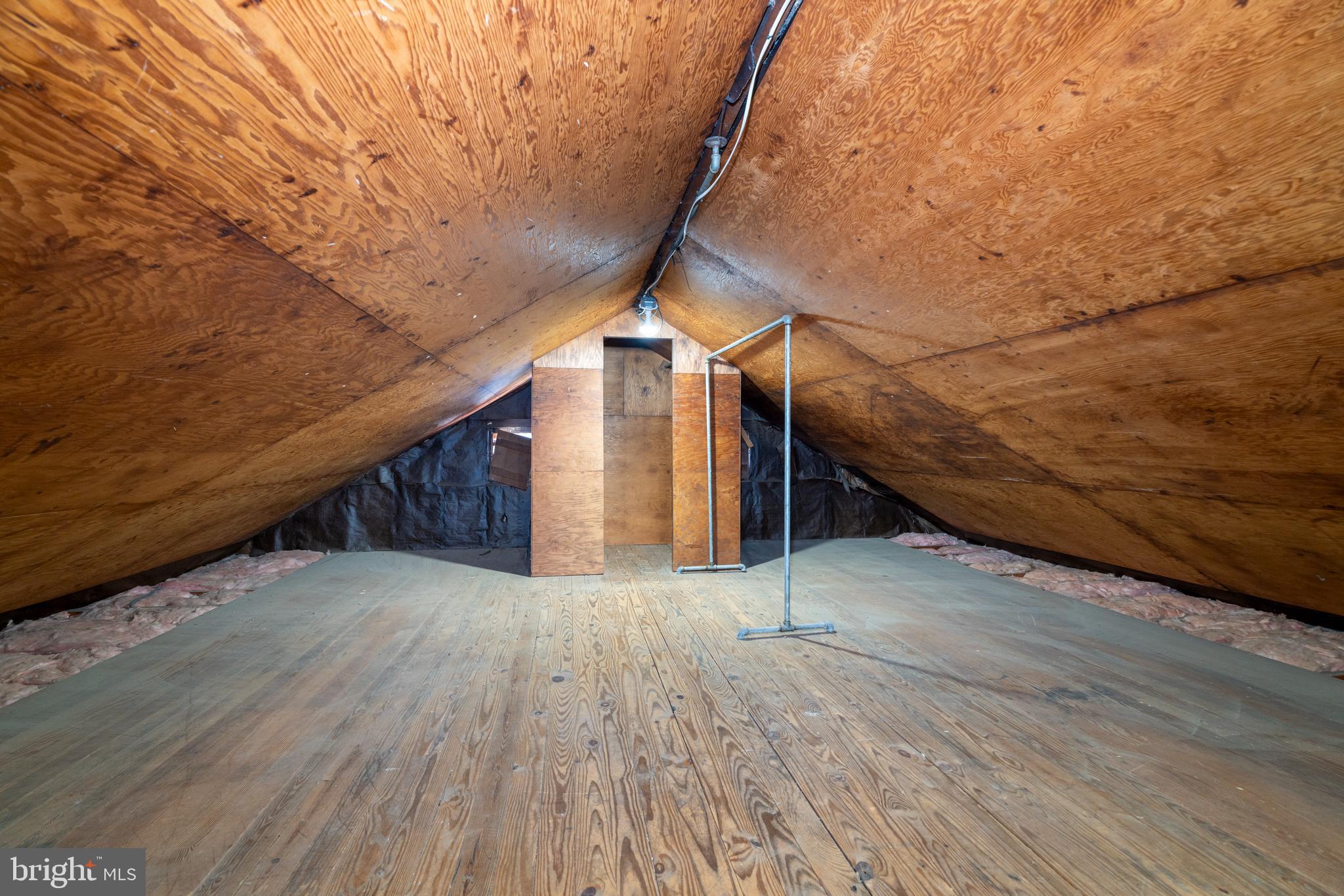 1017 Regester Avenue Baltimore, MD 21239 - Photo 22 of 43 Walk up attic is floored for so much storage space