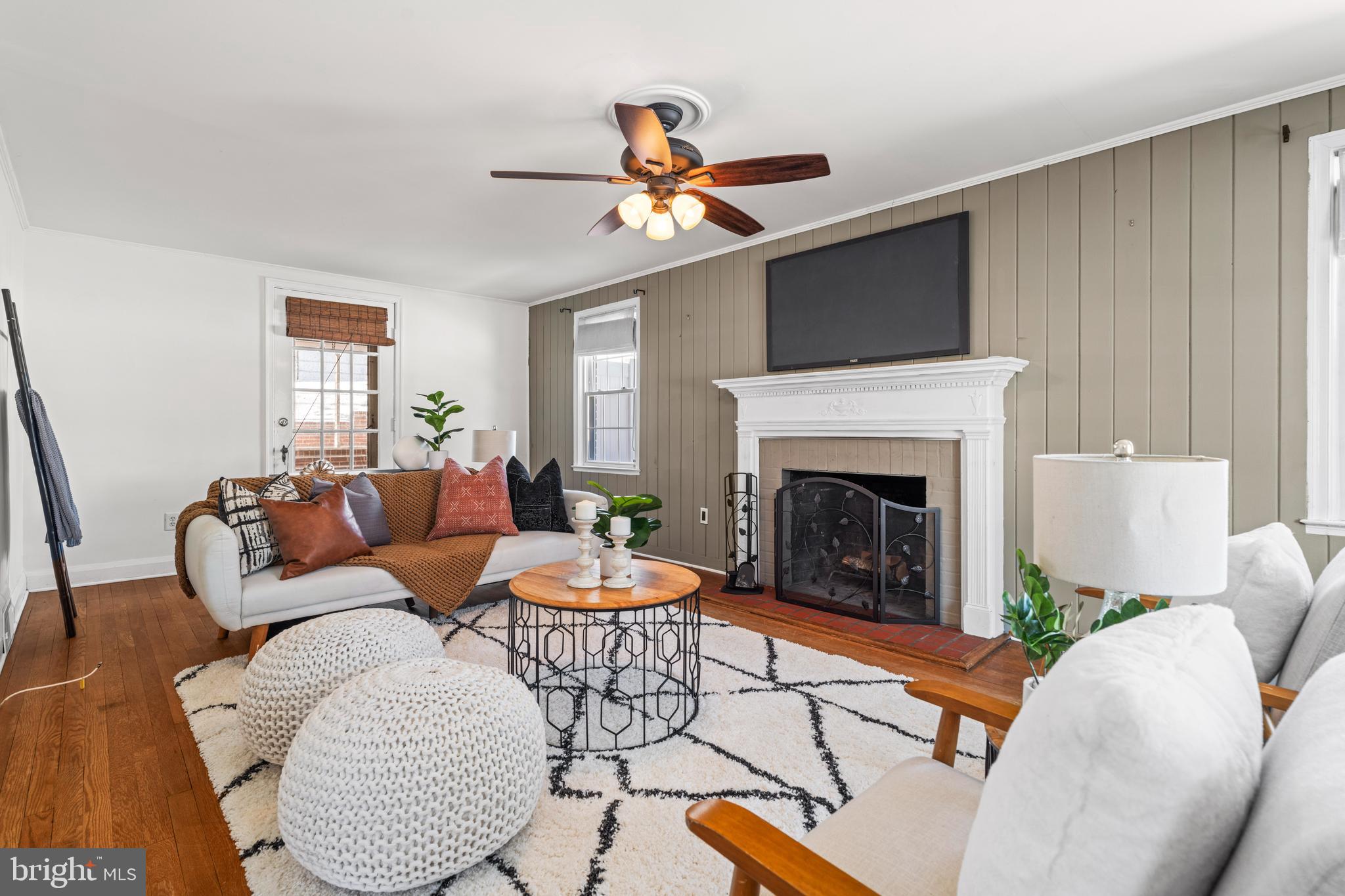 1017 Regester Avenue Baltimore, MD 21239 - Photo 3 of 43 Large living room with wood burning fireplace