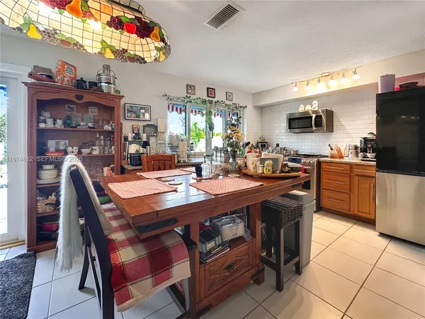 $675,000 | 11501 Northwest 41st Street, Sunrise, FL 33323