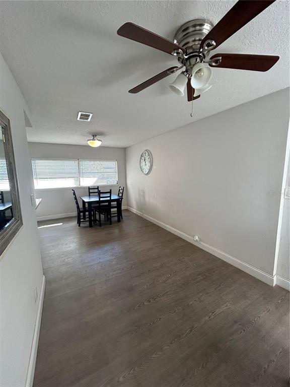 48 East Par Street Orlando, FL 32804 - Photo 19 of 25 a view of work space with furniture and chandelier fan