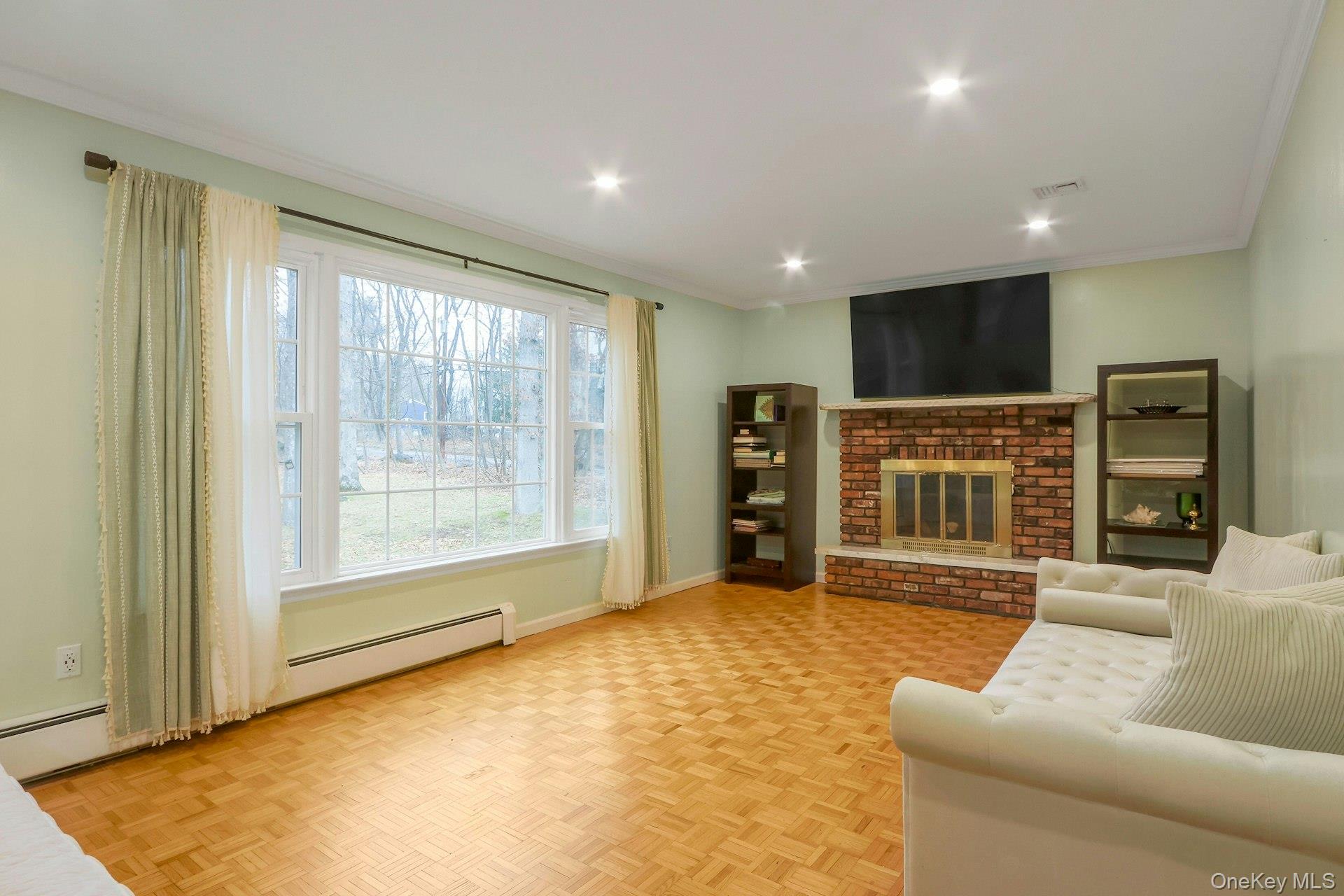 2 Rone Court New City, NY 10956 - Photo 20 of 50 Family Room w/ FP Hardwood & LED Recessed Lighting