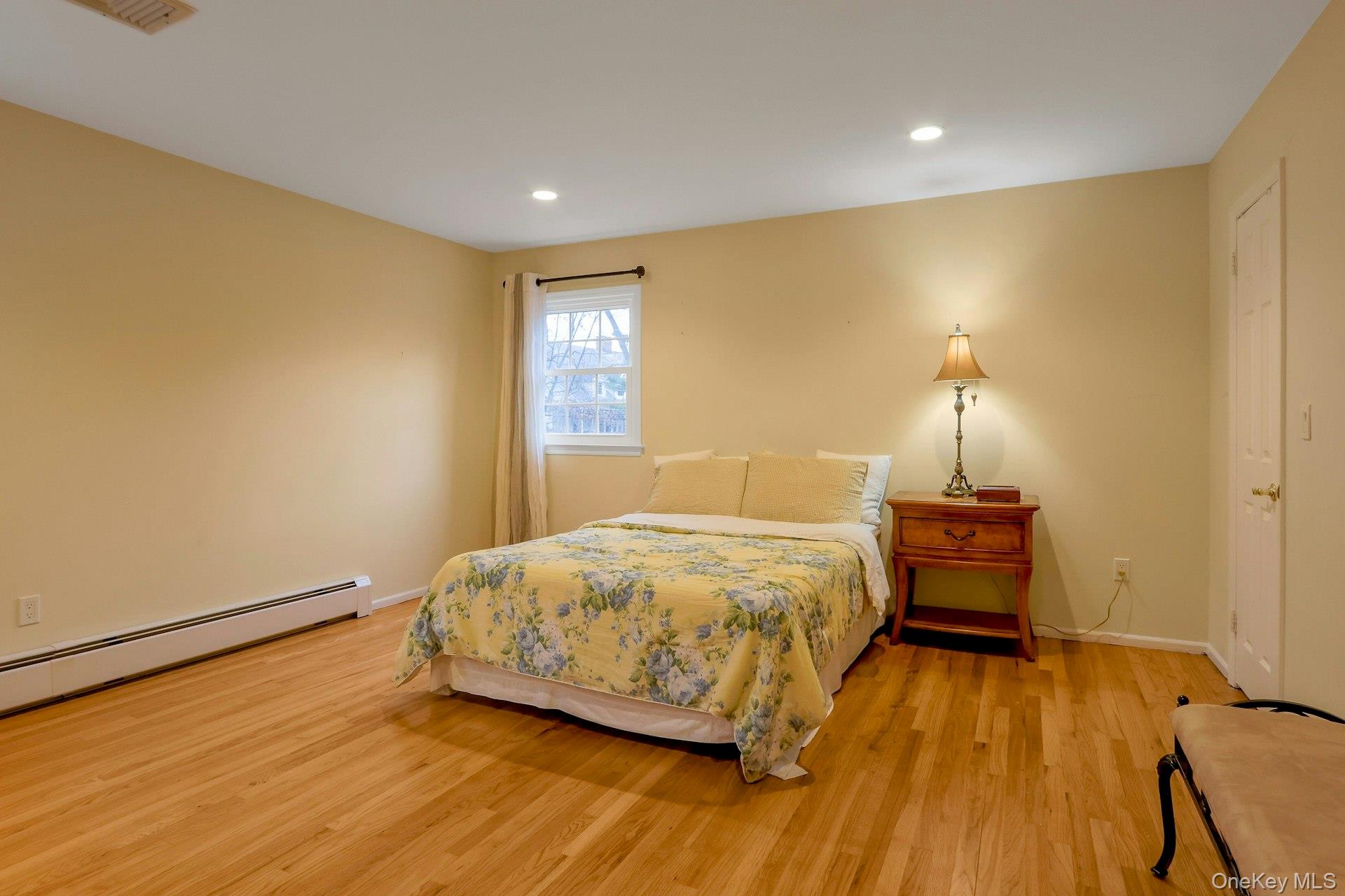 2 Rone Court New City, NY 10956 - Photo 26 of 50 Primary Bedroom w/ Hardwood & LED Recessed Lighting