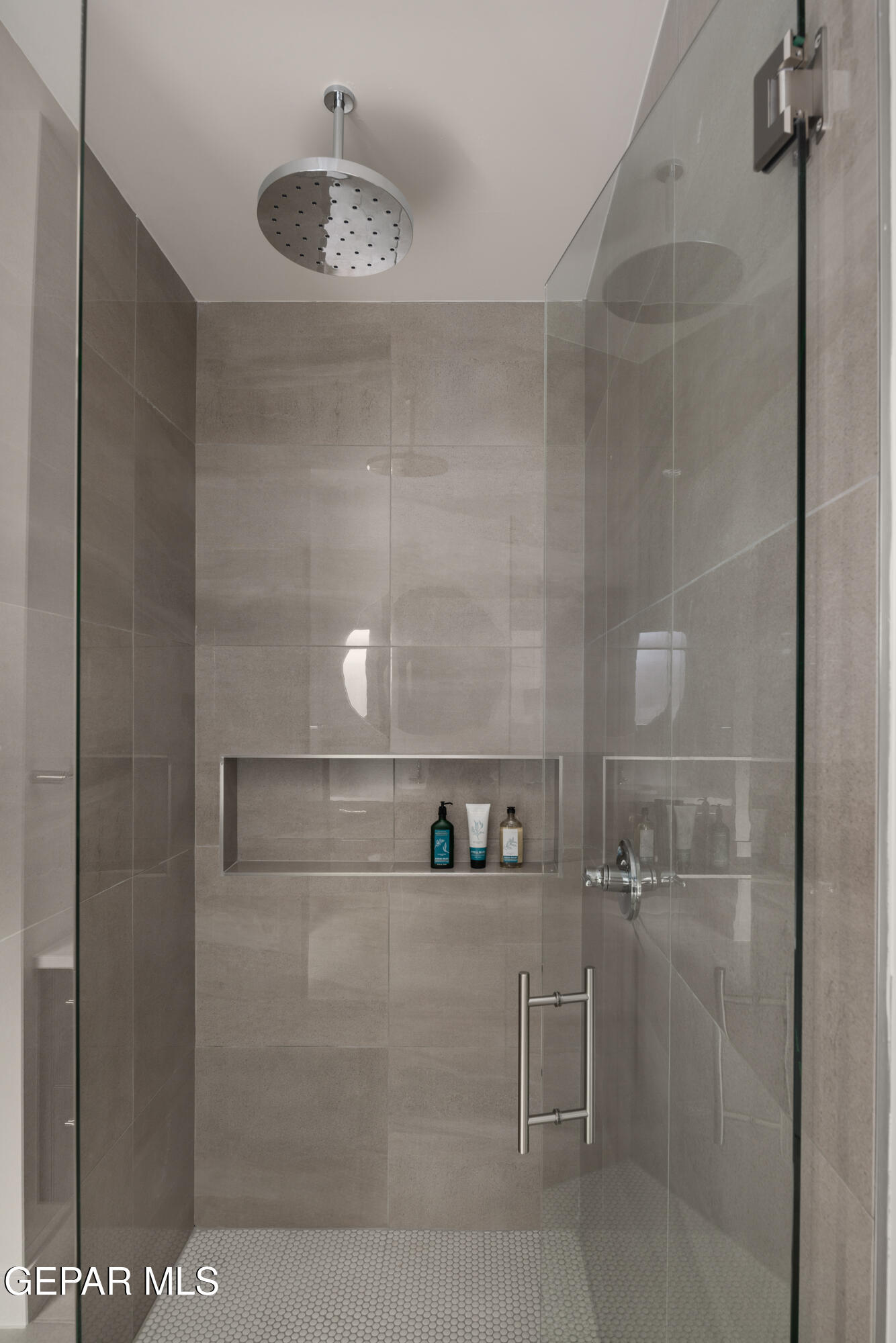1860 War Path El Paso, TX 79911 - Photo 11 of 12 a bathroom with a shower