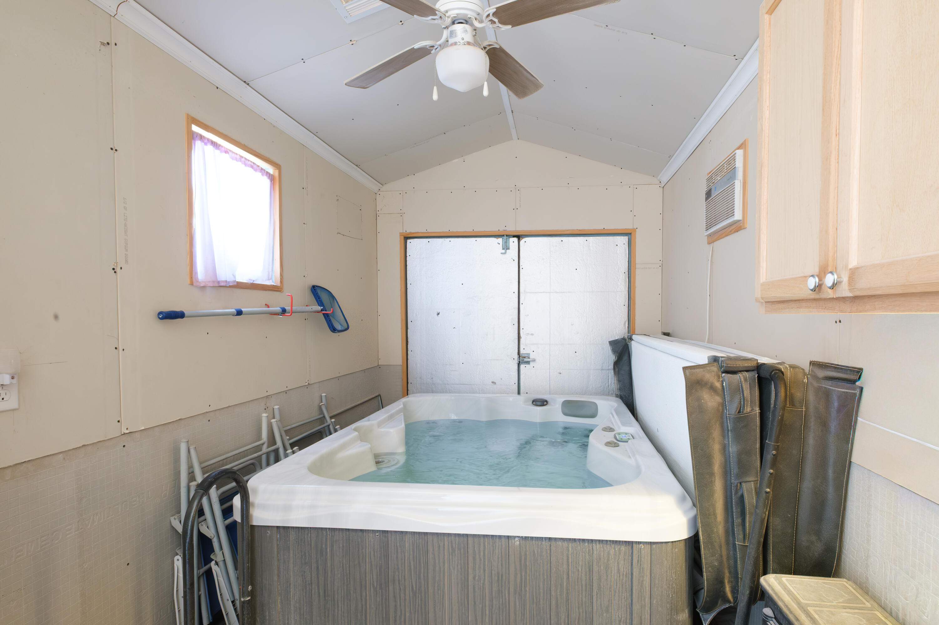 6821 39th Street Lubbock, TX 79407 - Photo 24 of 25 a bathroom with a sink a toilet and mirror