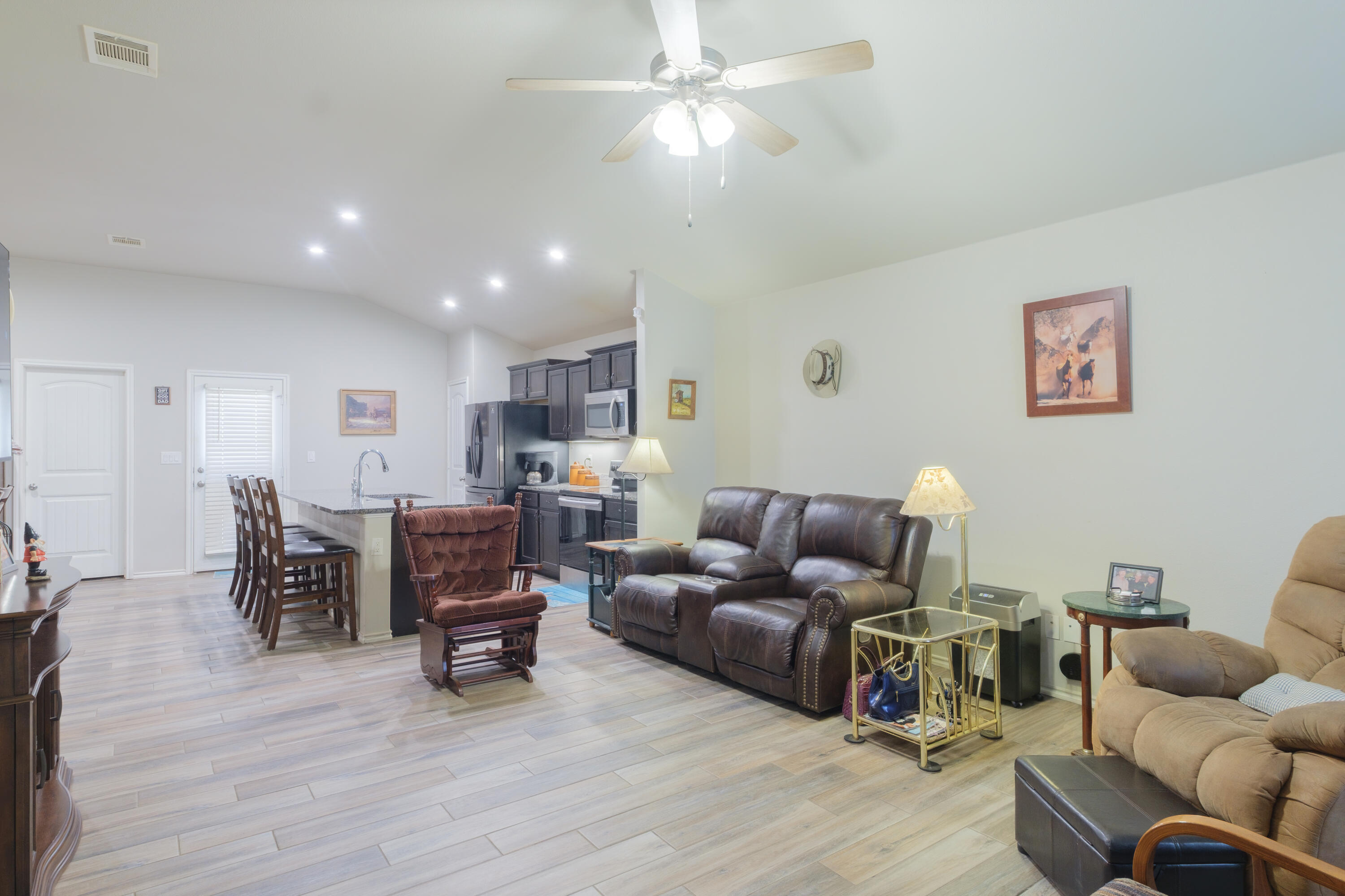 6821 39th Street Lubbock, TX 79407 - Photo 5 of 25 a living room with furniture