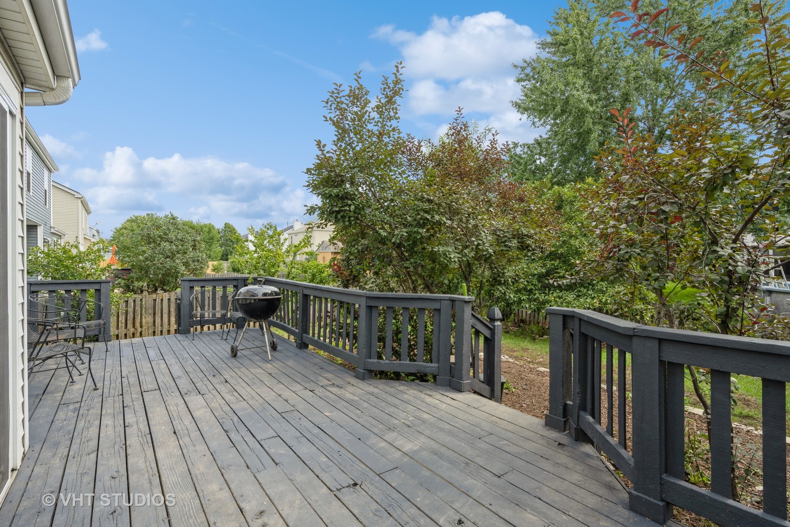 583 Greystone Lane Bolingbrook, IL 60440 - Photo 23 of 28 a view of balcony with deck and wooden floor