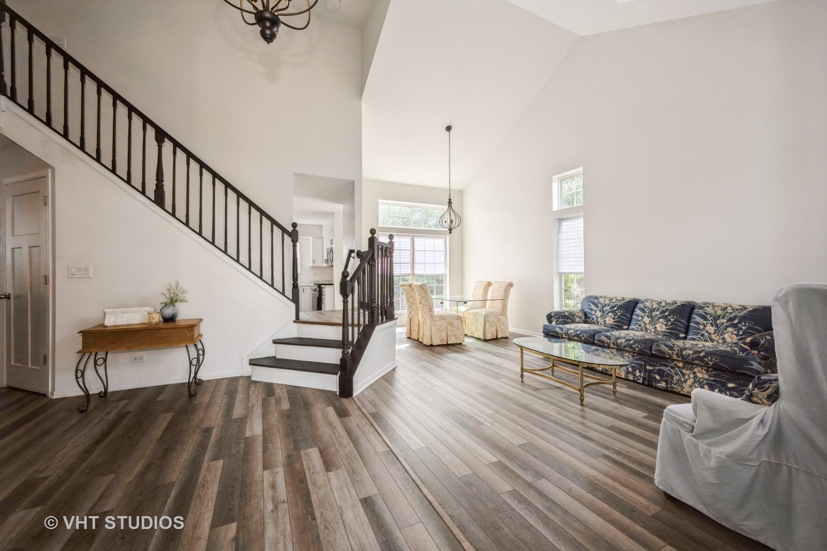 583 Greystone Lane Bolingbrook, IL 60440 - Photo 3 of 28 a view of living room filled with furniture and wooden floor